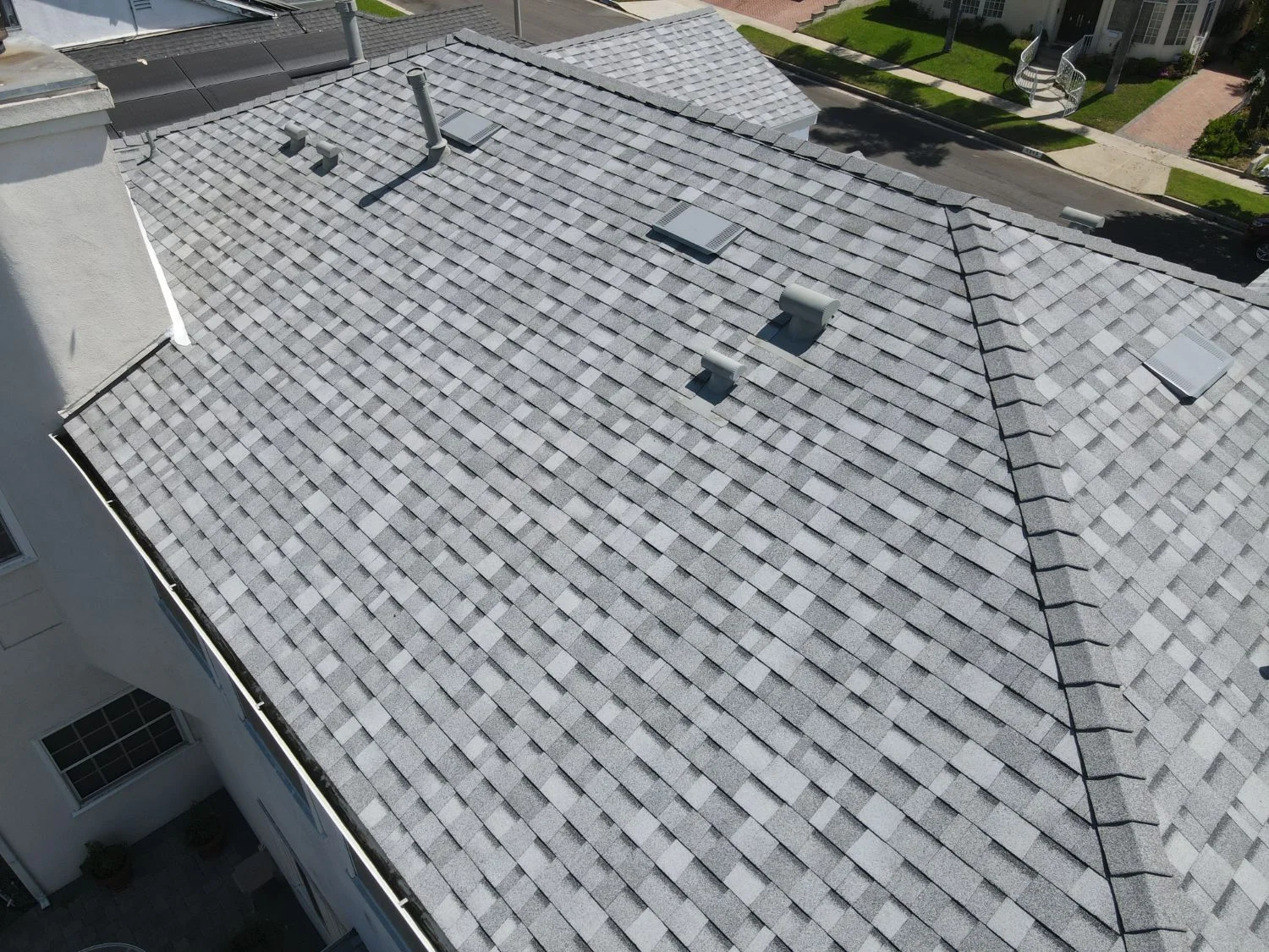 Close aerial view of a dimensional shingle roof on a Southern California home